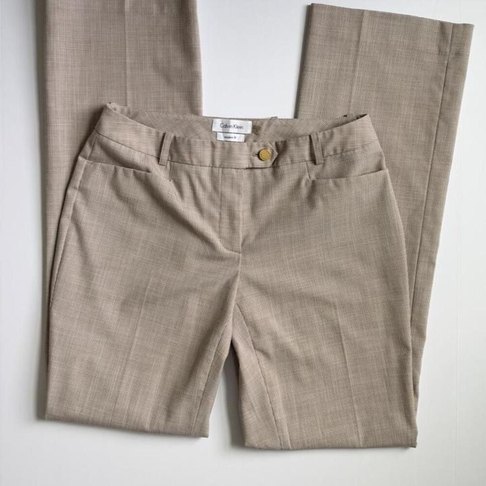 Women’s Calvin Klein beige dress pants with gold toned button details